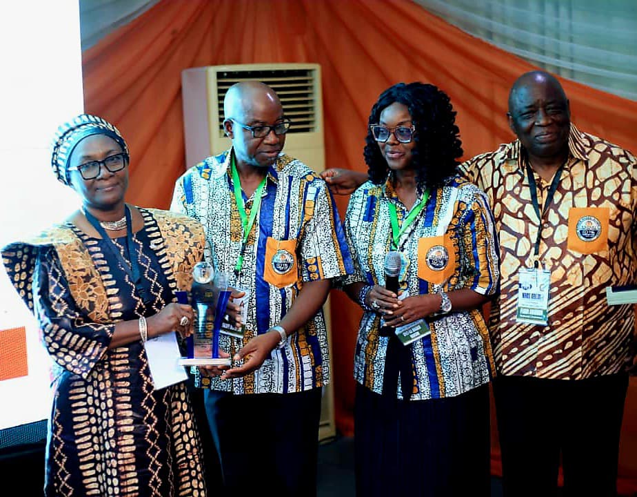 Prof Jane Ande is handed an Award by the Haggai Nigeria Leadership